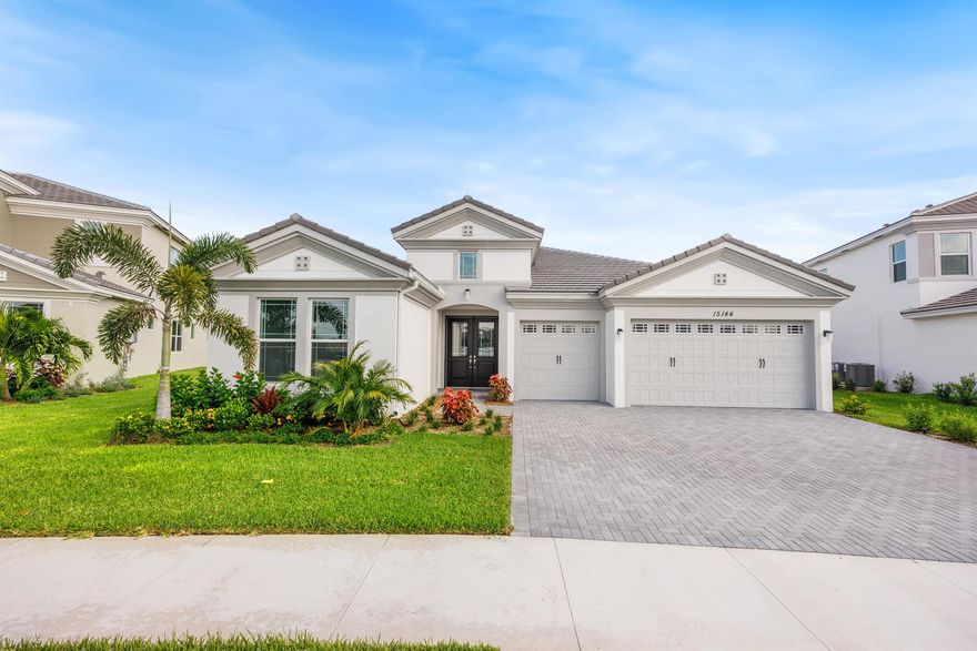 Welcome to your dream home! This brand-new, never-lived-in Sanderling model in Westlake, Florida is where luxury, comfort, and style meet--without the wait. No need to spend months building--this stunning home is already complete and ready for you. With 5 bedrooms, 4 bathrooms, and a spacious 3-car garage, this single-story masterpiece offers a thoughtful, open layout perfect for both everyday living and grand entertaining.As you arrive at the quiet cul-de-sac, you'll immediately notice the oversized pie-shaped lot--a rare find--perfectly positioned to offer stunning water views from every angle with no rear neighbors in sight. Step inside and be greeted by soaring ceilings, abundant natural light, and gorgeous tile flooring throughout that adds elegance to every step.