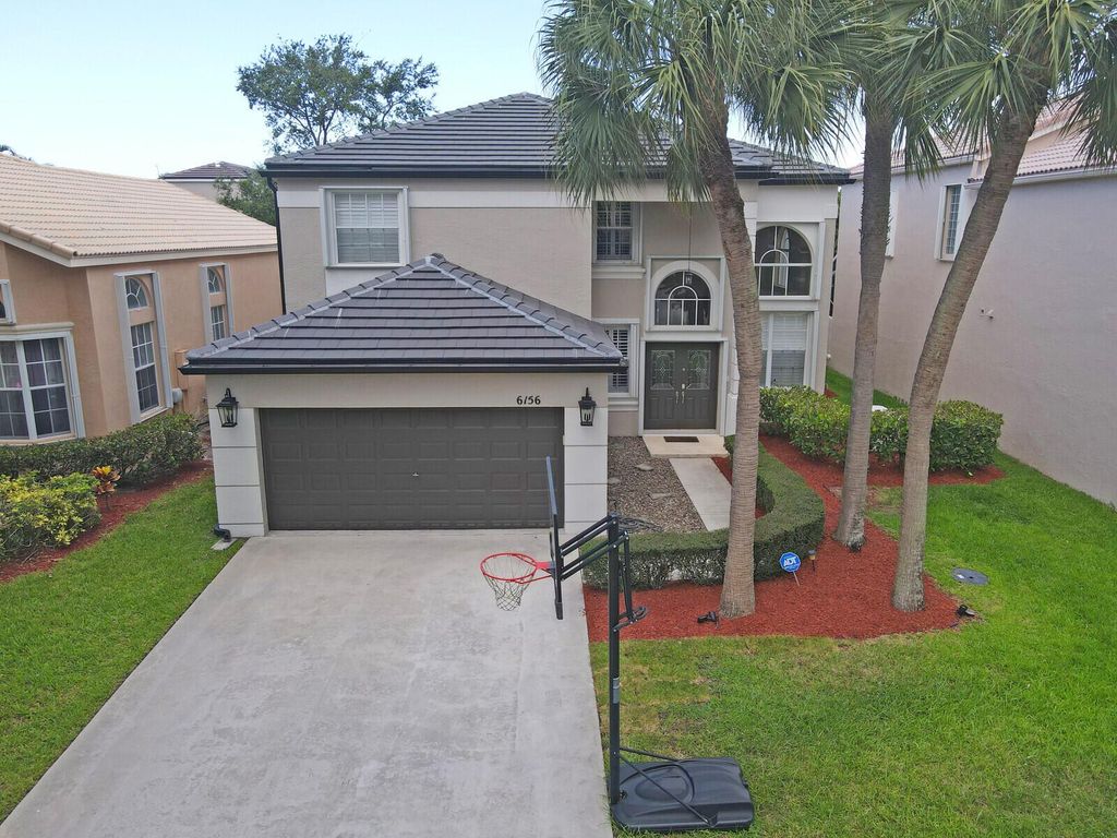Photo of 6156 Branchwood Drive, Lake Worth, FL 33467 (MLS # R11098540)