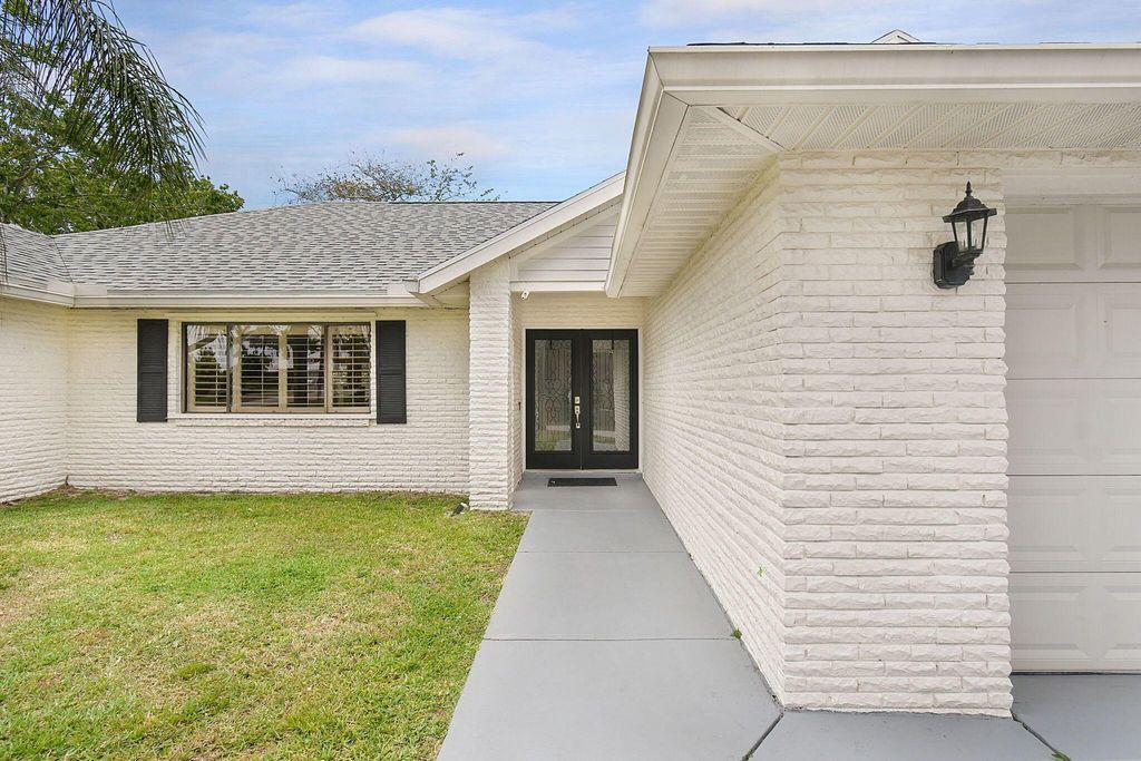 Photo of 2601 SW Union Terrace, Port Saint Lucie, FL 34953 (MLS # R10973068)