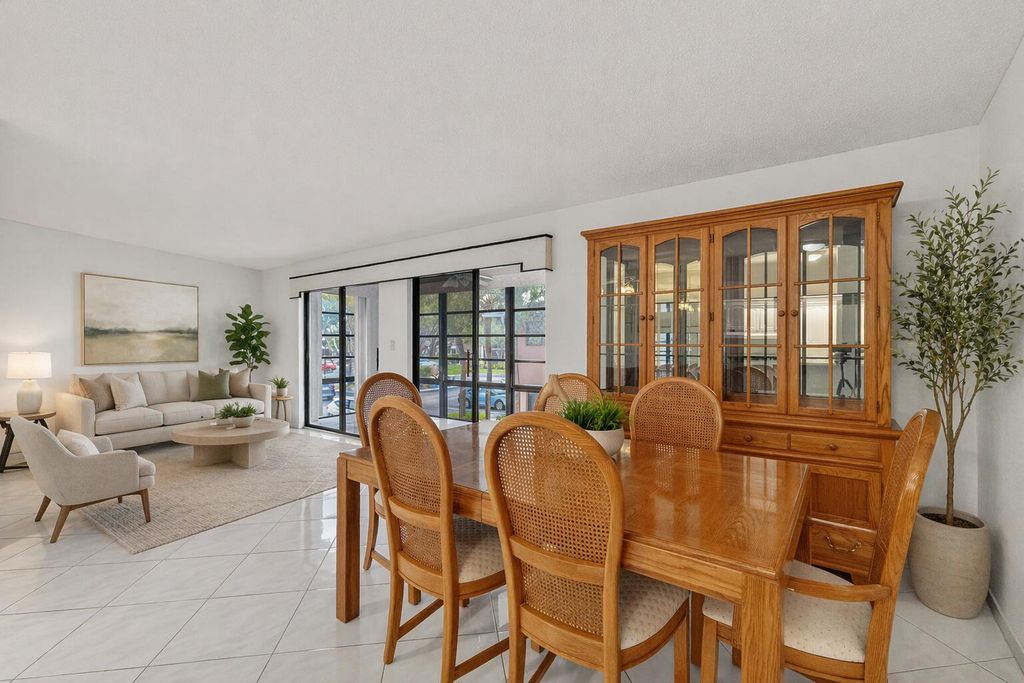 Photo of 7648 Ashmont Circle #212, Tamarac, FL 33321 (MLS # B26018955)