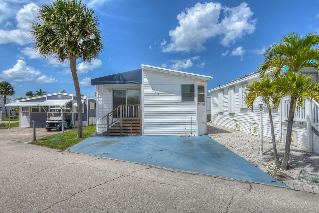 Photo of 1262 Nettles Boulevard, Jensen Beach, FL 34957 (MLS # R10898290)