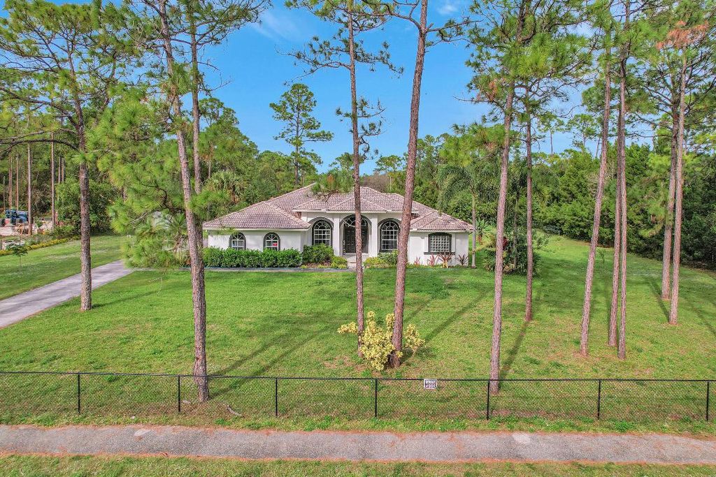 Photo of 17315 Key Lime Boulevard, Loxahatchee, FL 33470 (MLS # R10943021)