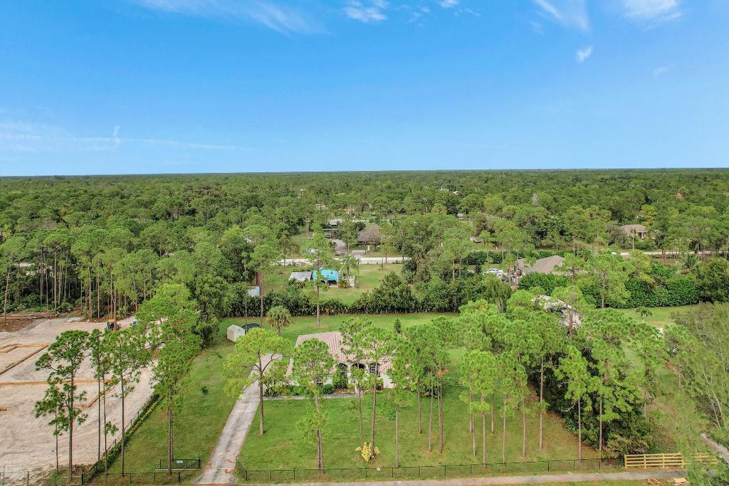 Photo of 17315 Key Lime Boulevard, Loxahatchee, FL 33470 (MLS # R10943021)