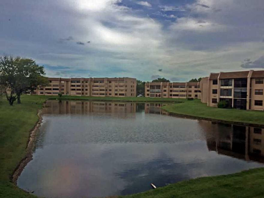 Great location with lake view. Nicely furnished, all appliances about 3 years old. Well maintained but needs some updating. Buyer must have good credit and minimum 30k annual income. 55 plus restriction. Easy to show on Lockbox, please use Show Assist tha nks!