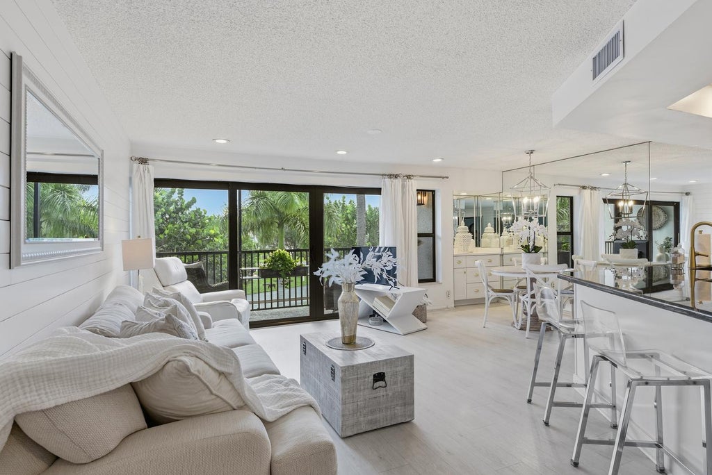 Photo of 1605 S Us Highway 1 #V2-203, Jupiter, FL 33477 (MLS # B26073565)