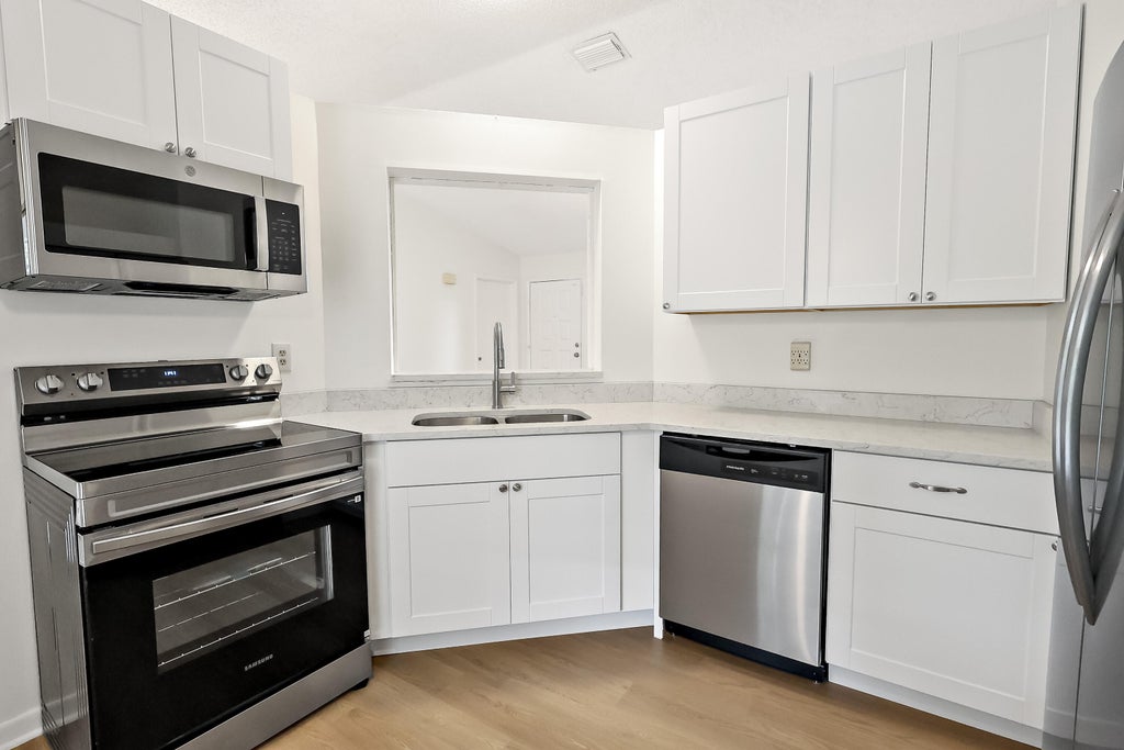 Photo of 2907 SW COASTAL Terrace, Port Saint Lucie, FL 34953 (MLS # B26072393)