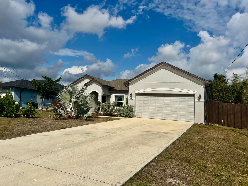 Photo of 370 SW Kestor Drive, Port Saint Lucie, FL 34953 (MLS # R11158060)