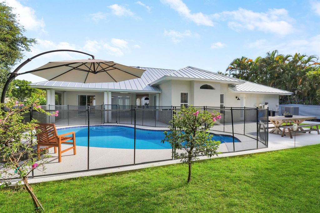 Photo of 2480 NW South Manor Ave, Stuart, FL 34994 (MLS # R10910223)