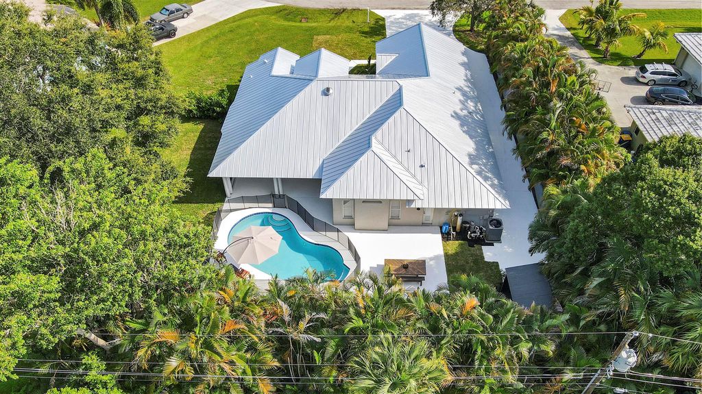 Photo of 2480 NW South Manor Ave, Stuart, FL 34994 (MLS # R10910223)