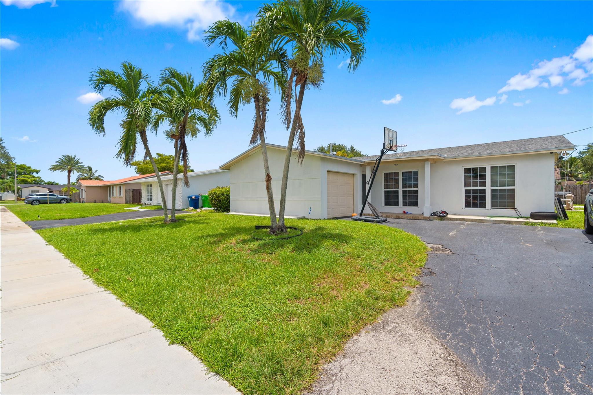 Beautifully maintained 3-bedroom, 2-bath single-family home with private pool in the heart of Sunrise! This charming home features a spacious layout with abundant natural light, impact windows, and tile flooring throughout. The upgraded kitchen and baths offer modern touches while the screened-in patio and large fenced yard with pool create the perfect space for entertaining or relaxing. No HOA, plenty of room for parking, and conveniently located near shops, schools, and highways. A true move-in ready gem—perfect home
