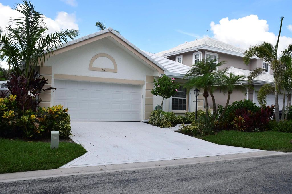Photo of 210 Canterbury Drive W, Palm Beach Gardens, FL 33418 (MLS # R11107016)