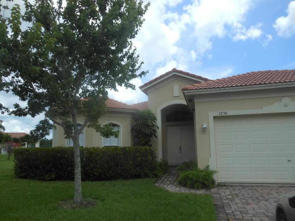 Photo of 5738 Place Lake Drive, Fort Pierce, FL 34951 (MLS # R10969817)