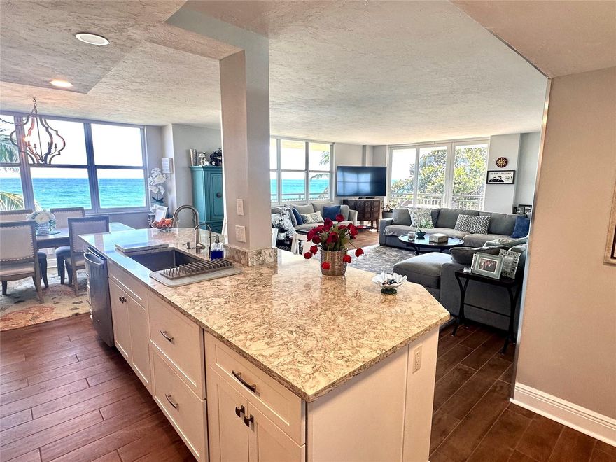 Indulge in refined oceanfront living in this beautifully renovated 2BR/2BA luxury residence offering breathtaking, unobstructed views of the Atlantic. This elegant home features wood-look porcelain tile throughout, Hurricane impact slider, a gourmet kitchen with granite countertops, and two exquisitely updated bathrooms. Both bedrooms are generously sized with abundant natural light and timeless finishes. Step outside to your private beach, resort-style pool, jacuzzi, state-of-the-art fitness center, game room, and business center. Water, sewer, cable, and high-speed internet included. Impeccably maintained building with 24-hour security. Furniture optional. A rare opportunity to enjoy beachfront elegance at its finest. This meticulously renovated residence offers an unparalleled beachfront lifestyle. Enjoy sunrises over the ocean, soothing coastal breezes, and resort-level amenities steps from your door. The building provides private beach access, a sparkling oceanfront pool, jacuzzi, state-of-the-art fitness center, game room, business center, and 24-hour security. Water, sewer, cable, and high-speed internet are included for effortless living. Furniture may be provided upon request. Ideal for tenants seeking sophistication, comfort, and a serene oceanfront retreat.