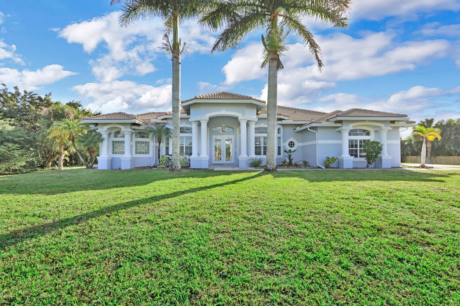 Gorgeous Florida retreat! This 4 bedroom, 3 full bath pool home has been beautifully remodeled and very tastefully decorated to make your dream vacation a reality. King master suite, 2 Queen suites, & twin w/trundle will sleep 8 comfortably. The huge master suite has French doors leading to the private, screened in pool and spa. The spacious master bath features double floating vanities, soaking tub and a dual head doorless walk in shower. Spacious and well-appointed kitchen opens to the enormous living room for entertaining with ease and comfort. The home even has a billiards table, ping pong and an office! Located on 2 acres in a quiet country setting yet close to beach. No annual leases. Available 2025-2026 season. NO PETS AT ALL.