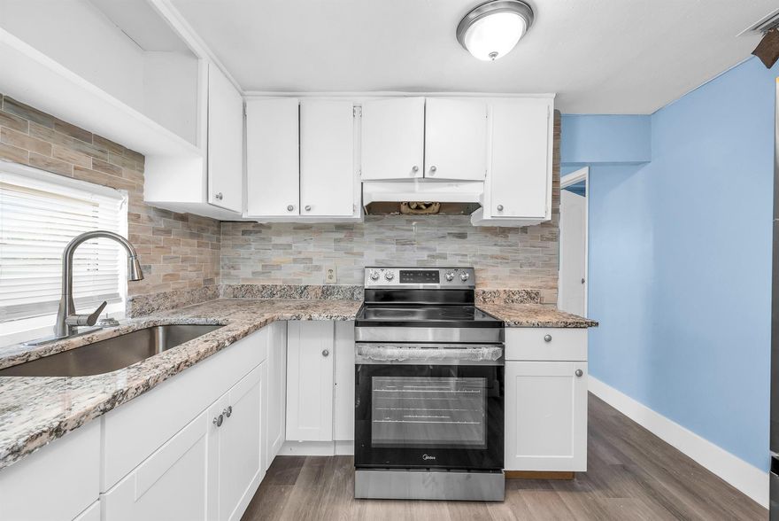 Redone 2 bedroom 1 bath single family home close to shopping, banks, and the beaches. Home has a brand new kitchen with granite counter tops and new stainless steel appliances. New luxury vinyl flooring throughout the house. Ready for immediate move in.