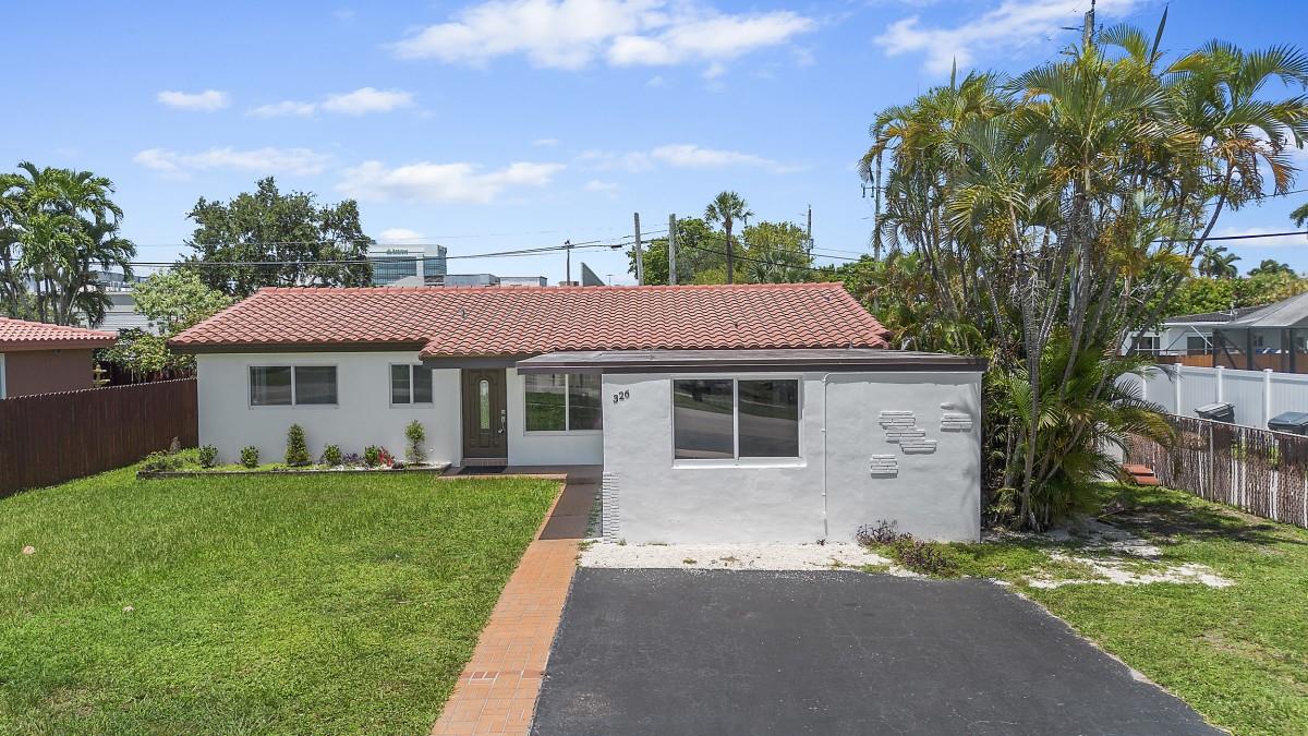 This 3/2 single-family residence is situated in the tranquil and well-established Orangebrook Golf Estates community of Hollywood and is priced below market value!! This property features a Florida room that can serve as an in-law suite or a separate rental due to its private entrance. Notable features include a barrel-tile roof (2017), hurricane-impact windows, an updated AC unit, a water heater, and more. The kitchen and bathrooms are primed for cosmetic enhancements with your personal touch.