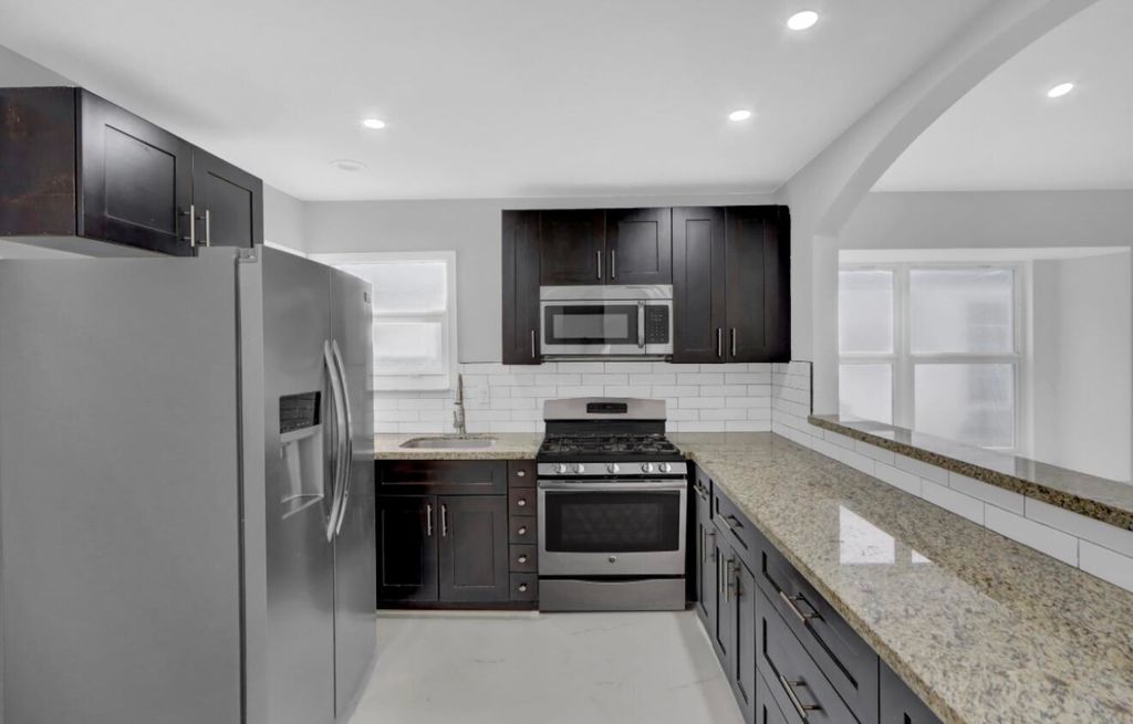 Photo of 1413 Blue Clover Lane, West Palm Beach, FL 33415 (MLS # R11161558)