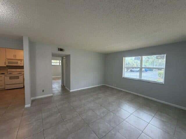 Photo of 760 SE 2ND Avenue #I102, Deerfield Beach, FL 33441 (MLS # B26057868)