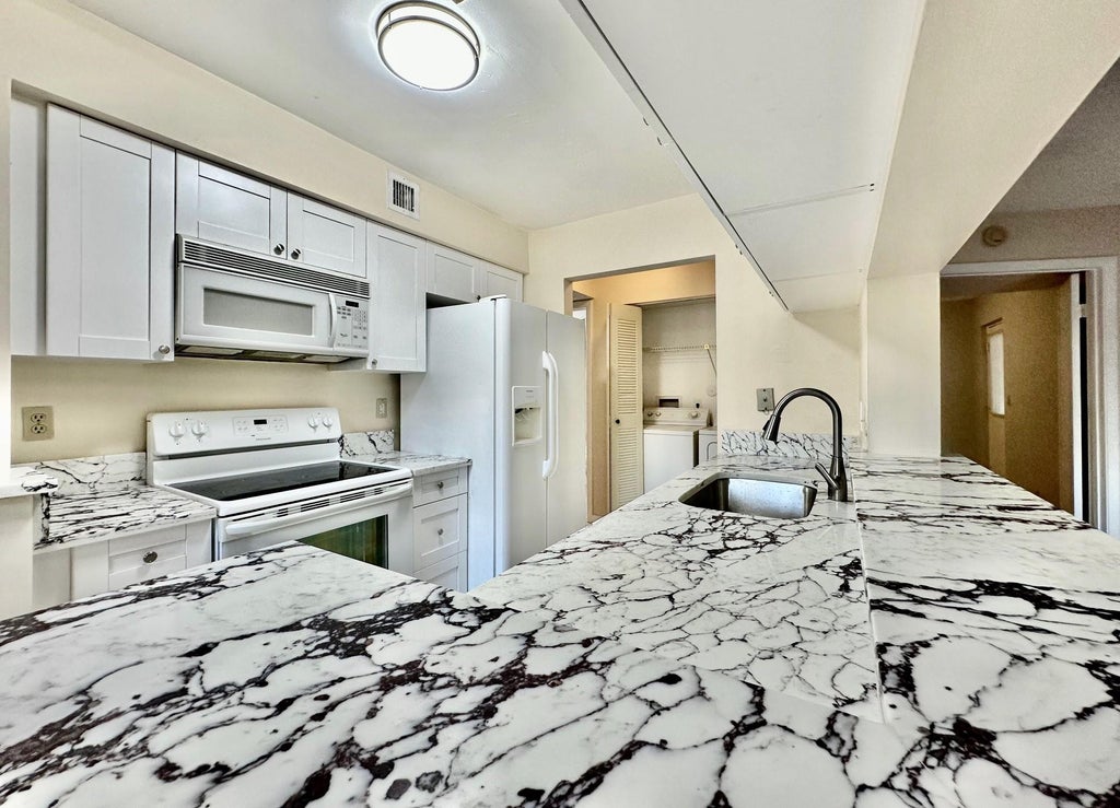 Photo of 9833 Westview Drive #818, Coral Springs, FL 33076 (MLS # F10509703)