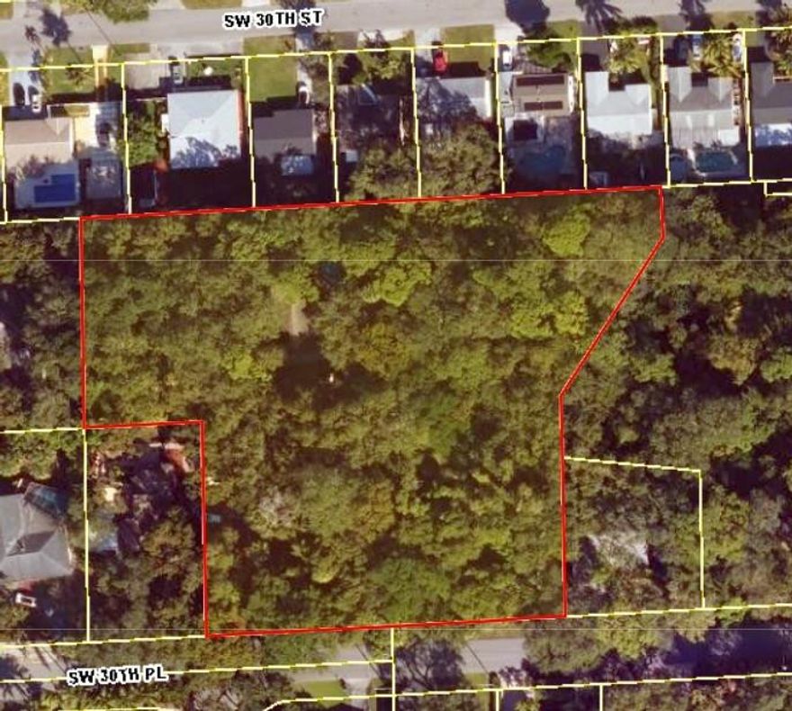 Located at 1711 SW 30th Place, Fort Lauderdale, FL 33315, this spacious property spans just over 2 acres and is zoned RS-8. It offers excellent development potential, with the capacity to build approximately 13.5 homes. The lot provides ample space for various housing projects, ideal for investors or developers. Its prime location offers convenient access to the Port Everglades, Fort Lauderdale-Hollywood International Airport, and all major freeways, making travel and transportation seamless. Close to local amenities and outdoor recreational areas, this site presents a fantastic opportunity for growth in a vibrant, well-connected area.