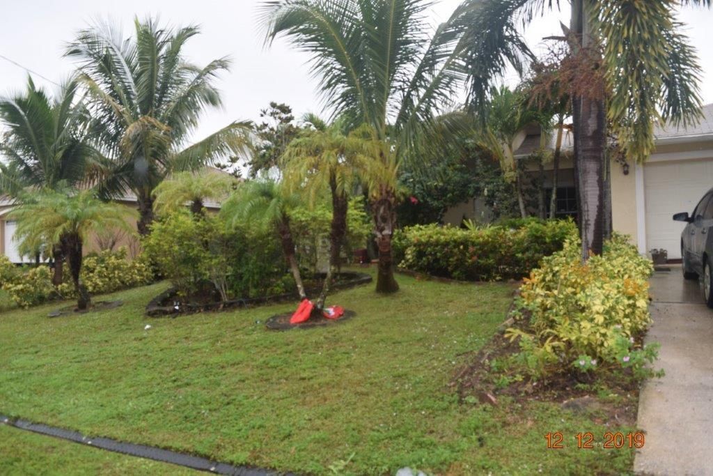 Photo of 3301 SW Mcmullen Street, Port Saint Lucie, FL 34953 (MLS # R10766661)