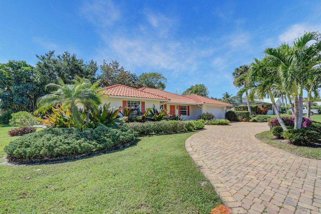 Photo of 8574 SE Seagrape Way, Hobe Sound, FL 33455 (MLS # B26004533)