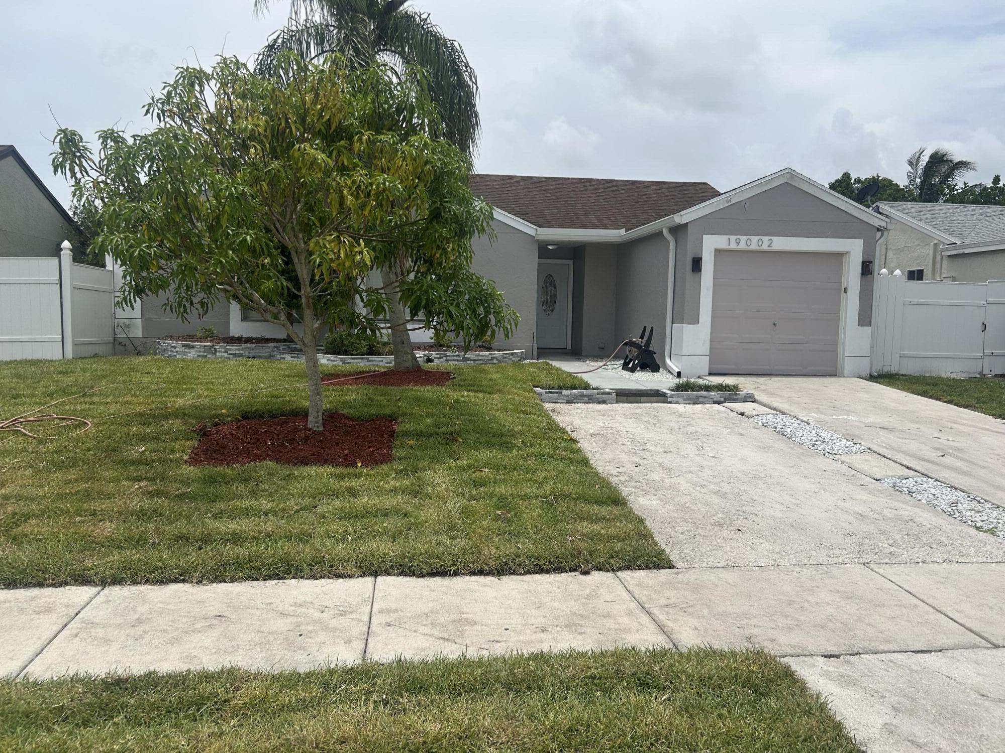 Updated property, shows as the pride of the neighborhood with updated Kitchen and baths, all impact windows and doors, new electrical panel, new A.C. and more. Very bright house with all tiled flooring, vaulted ceilings, fabulous outdoor covered patio with built-in grill area, totally fenced yard to enjoy your family time. The community offers a large pool and tennis courts as well as basic cable for all residents.