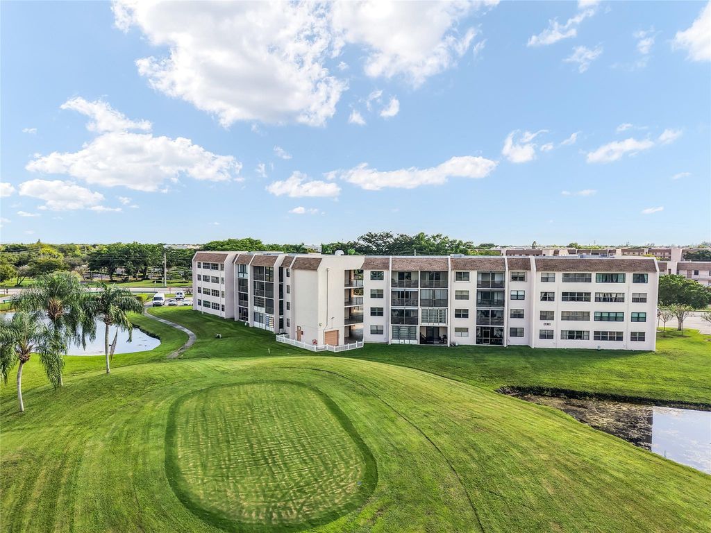 Photo of 10101 Sunrise Lakes Blvd #204, Sunrise, FL 33322 (MLS # F10531658)