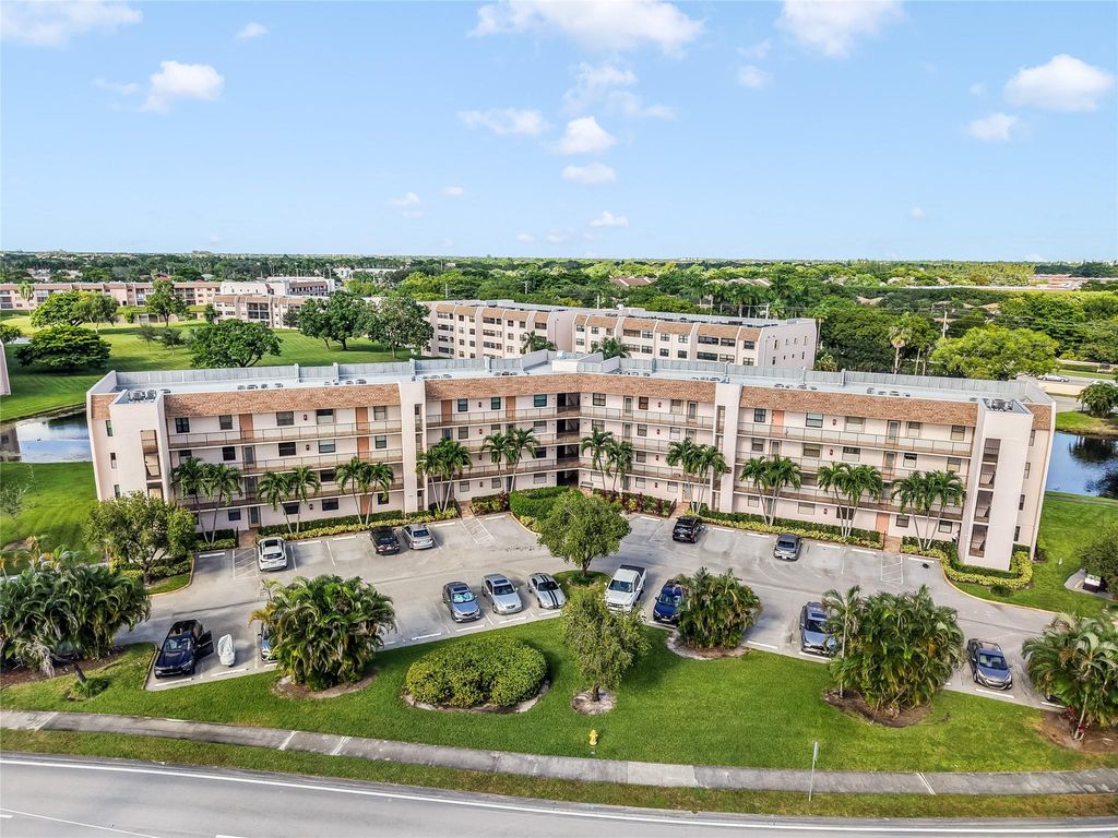 Photo of 10101 Sunrise Lakes Blvd #204, Sunrise, FL 33322 (MLS # F10531658)