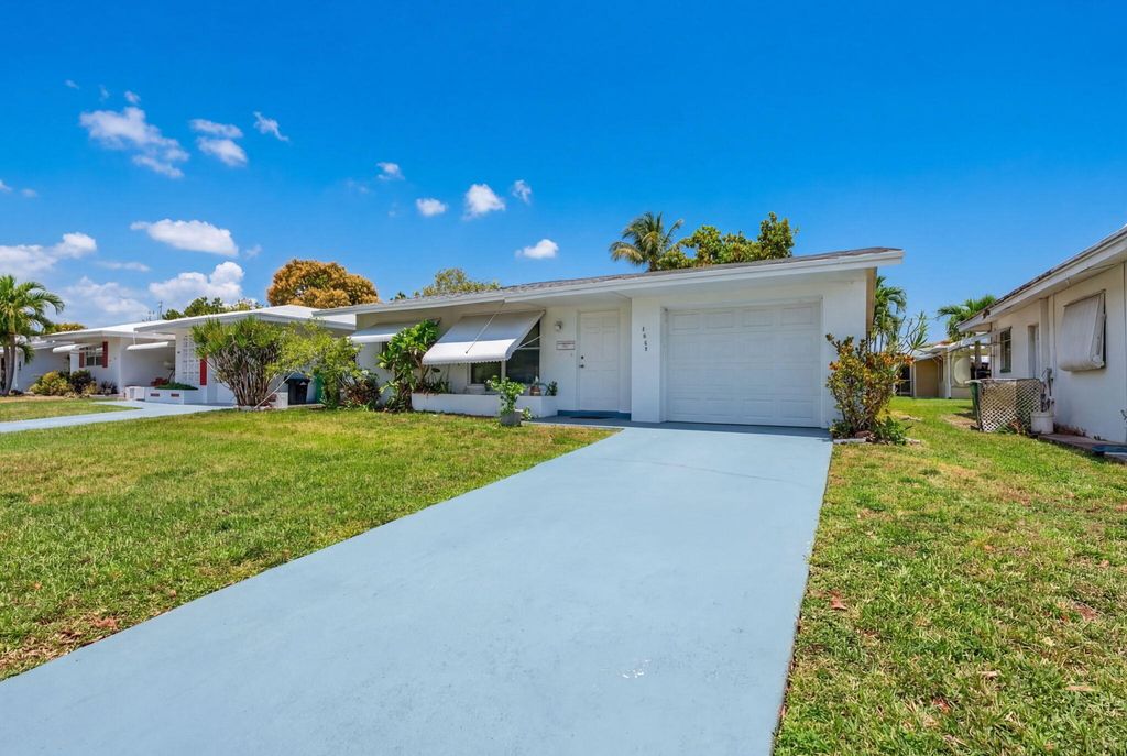 Photo of 4955 NW 47th Terrace, Tamarac, FL 33319 (MLS # B26005283)