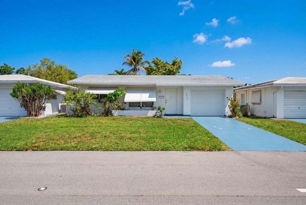 Photo of 4955 NW 47th Terrace, Tamarac, FL 33319 (MLS # B26005283)