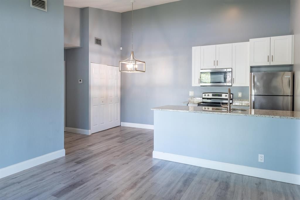 Photo of 6404 Chasewood H Drive Dr #H, Jupiter, FL 33458 (MLS # R10825219)