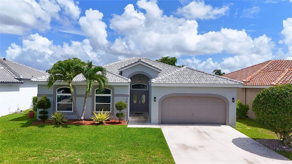 Photo of 5985 NW 72nd Court, Parkland, FL 33067 (MLS # F10508625)