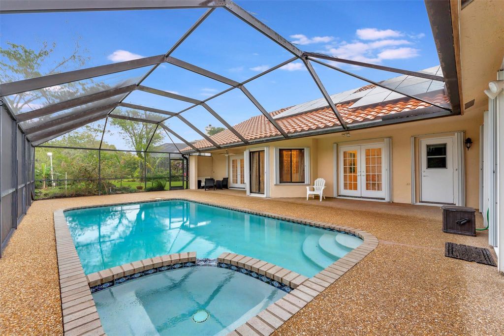 Photo of 5911 NW 53rd Street, Coral Springs, FL 33067 (MLS # F10454898)