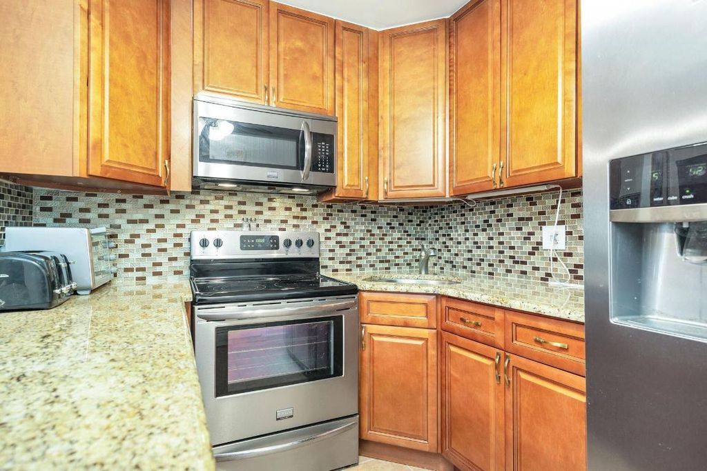 Photo of 308 Pine Ridge Circle #B-1, Greenacres, FL 33463 (MLS # R10944910)