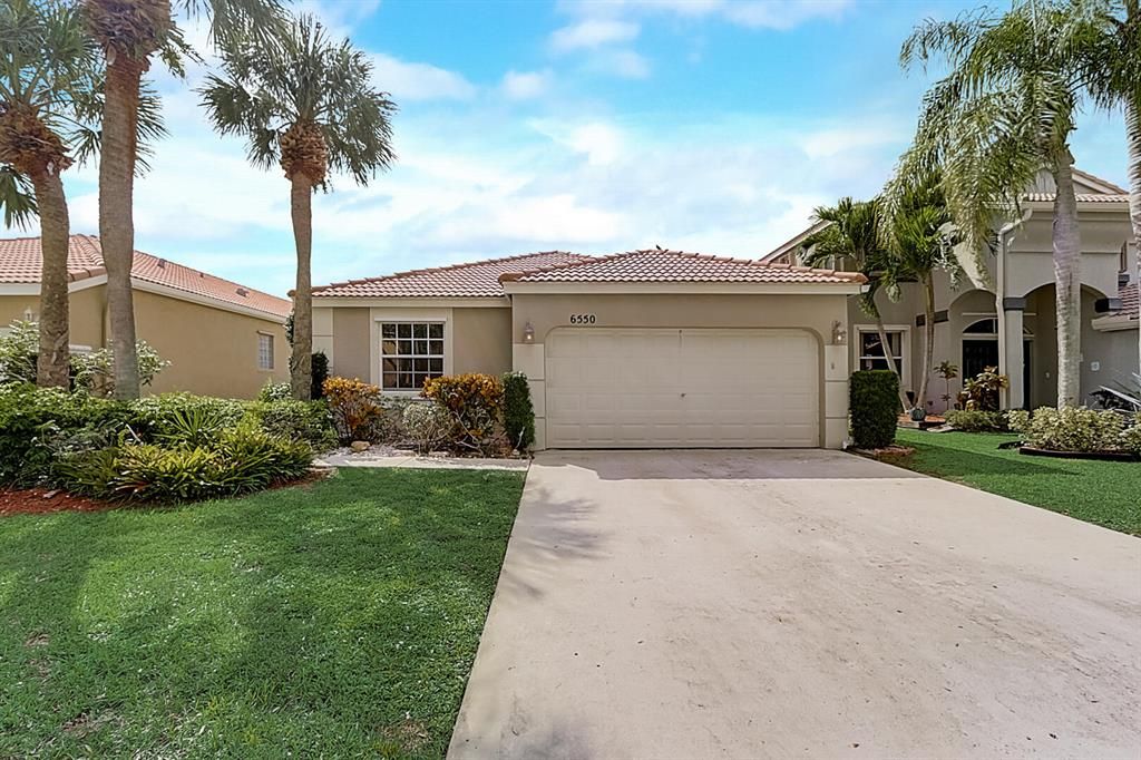 Photo of 6550 Columbia Avenue Ave, Lake Worth Beach, FL 33467 (MLS # R10753790)