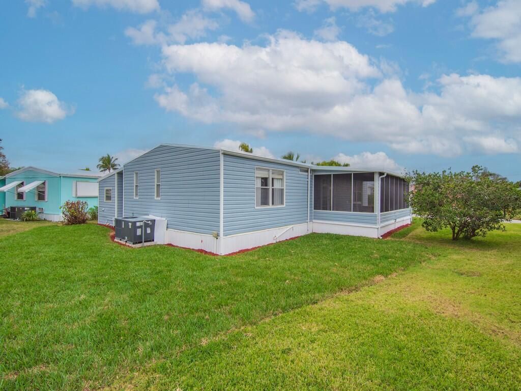 Photo of 395 NE Jade Circle, Jensen Beach, FL 34957 (MLS # R11154111)