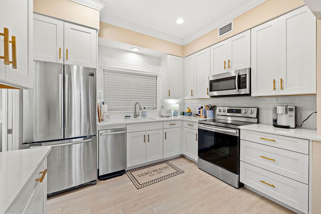 Photo of 5025 Harmony Circle Circle #103, Vero Beach, FL 32967 (MLS # R11158345)