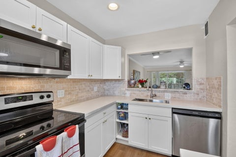 Tiny photo for 150 LAKE MERYL Drive #244, West Palm Beach, FL 33411 (MLS # B26091184)