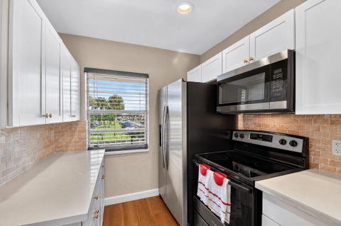 Tiny photo for 150 LAKE MERYL Drive #244, West Palm Beach, FL 33411 (MLS # B26091184)
