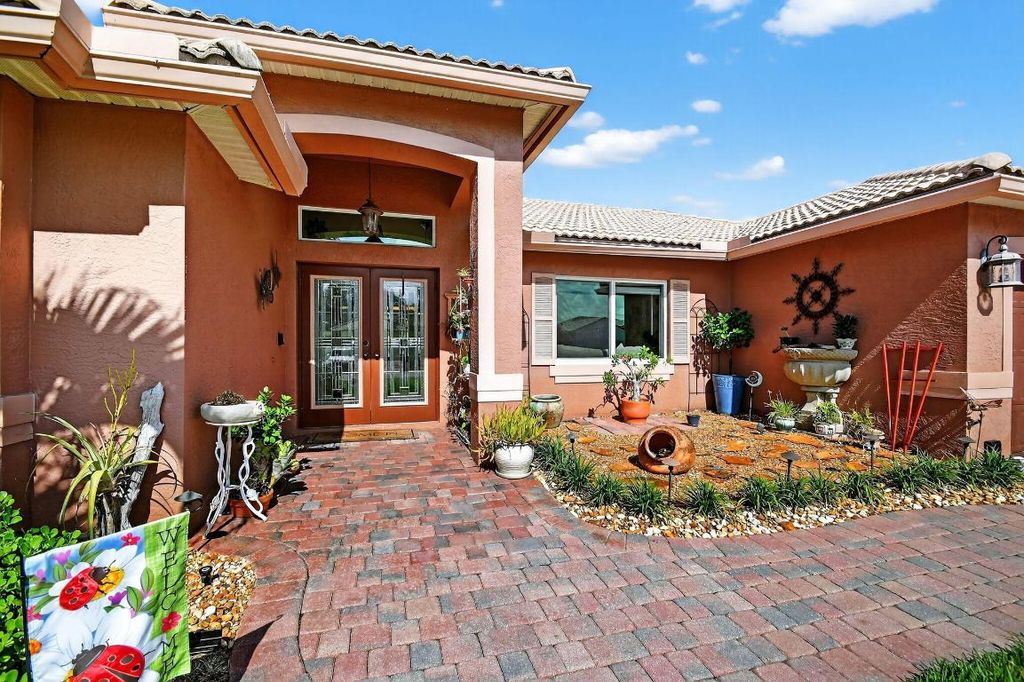 Photo of 3765 Cypress Lake Drive, Lake Worth, FL 33467 (MLS # R11114245)