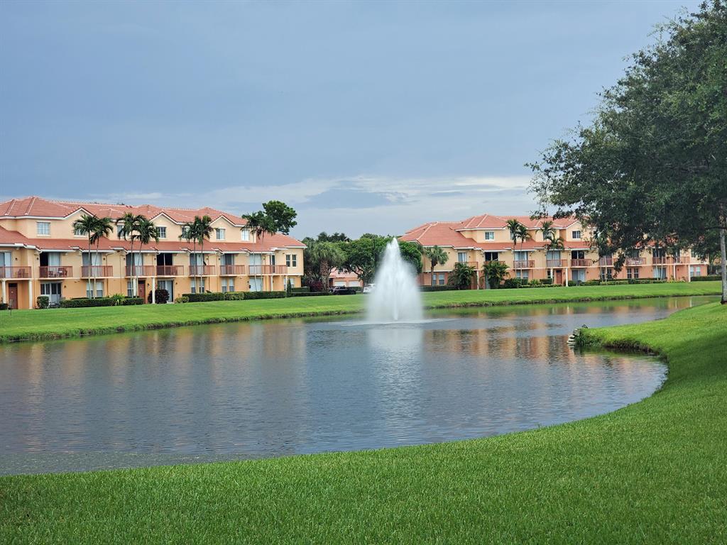 Beautiful first floor condo with breathtaking water views and sunsets. Walk into paradise in this one bedroom Caribbean dream home in famed Delray Beach. Open dinning and living areas with water views. NEW floors throughout. Full size washer and dryer. Large walk in closet and tub in master bath. Open patio area with water views. Pet friendly community and landlord. Walk to Whole Foods, to the community pool, clubhouse, restaurants, entertainment and all that Delray Beach has to offer. Plenty of parking spaces for you and your guests. Move in ready available immediately. Resorts Style community with pool, tennis, clubhouse, fitness, volley ball, basketball, auto cleaning station and more. Call for showing.