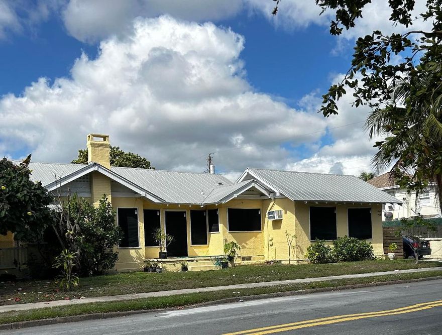 Northwood Harbor Historic District. Park at 45th St. and Flagler. Near new NOMAR development. Put together your wish list and restore your way. Large side yard. Room for a pool, metal roof on the mainhouse, Hurricane screen protecting all windows.
