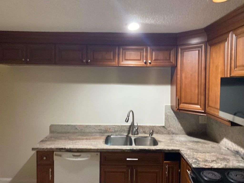 Photo of 5029 NW 5TH Street, Delray Beach, FL 33445 (MLS # B26078557)