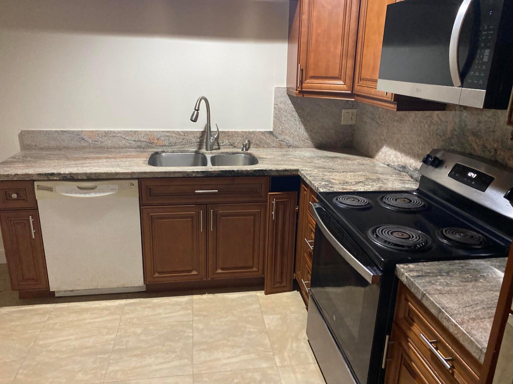 Photo of 5029 NW 5TH Street, Delray Beach, FL 33445 (MLS # B26078557)