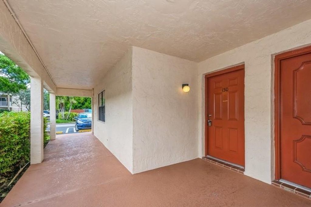 Photo of 2947 Riverside Drive #130, Coral Springs, FL 33065 (MLS # F10444670)