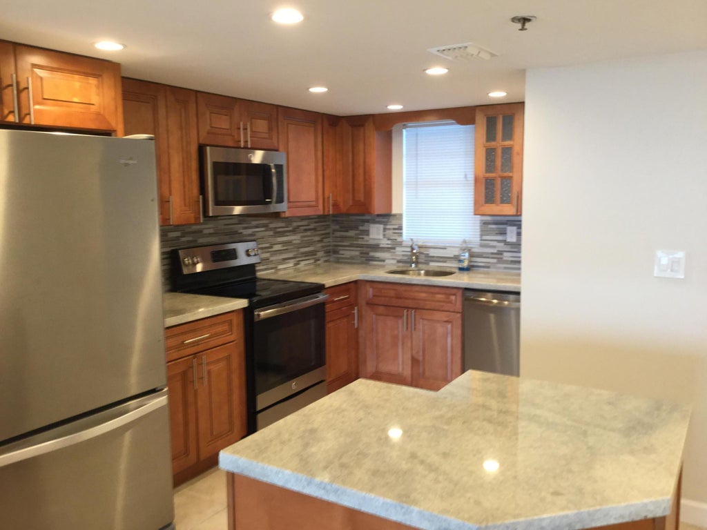 Photo of 3001 W ROLLING HILLS Circle #709, Davie, FL 33328 (MLS # B26080093)