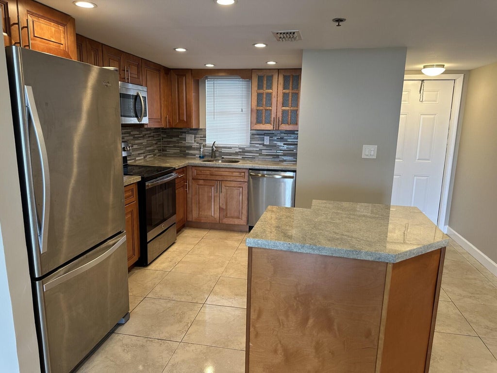 Photo of 3001 W ROLLING HILLS Circle #709, Davie, FL 33328 (MLS # B26080093)