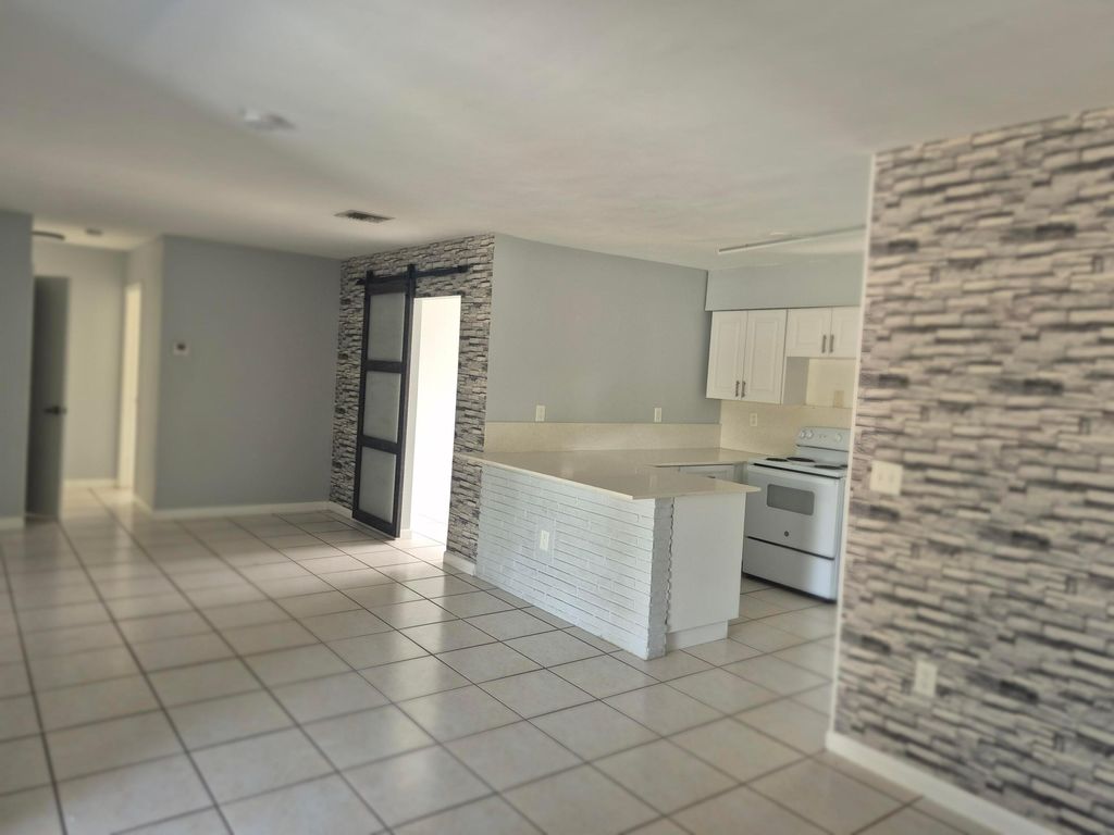 Photo of 7221 Venetian Street #4, Miramar, FL 33023 (MLS # B26024386)