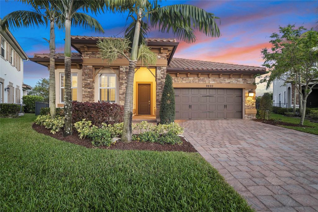 Photo of 9820 S Miralago Way, Parkland, FL 33076 (MLS # F10534049)